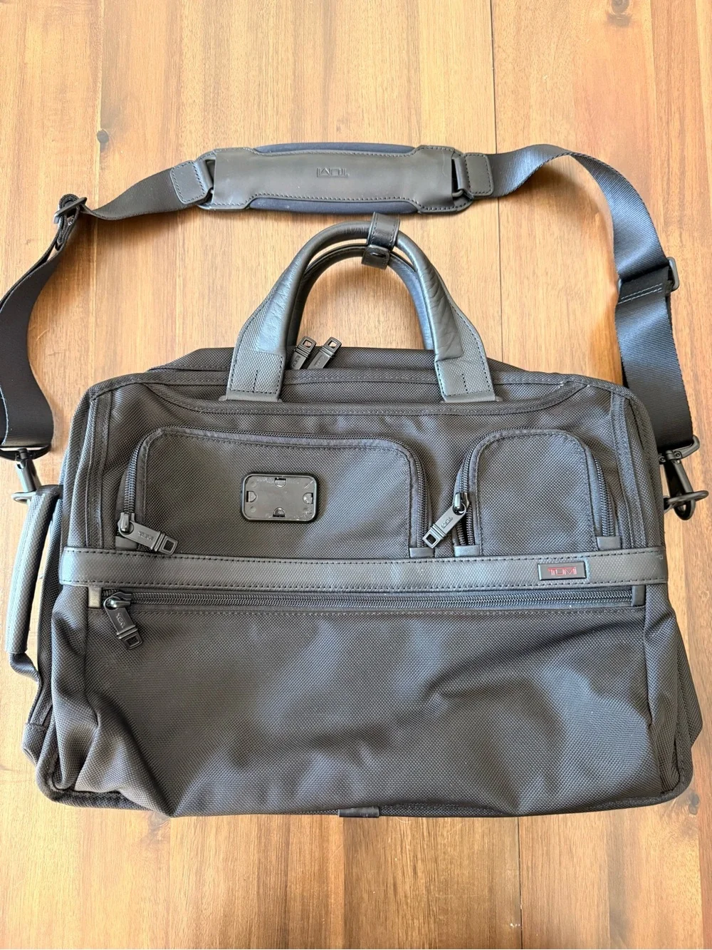 Tumi sleek black